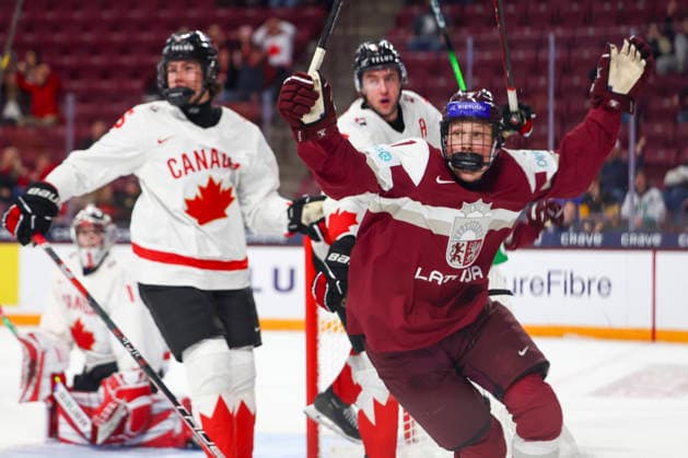 December 27, 2025, Minneapolis, Minnesota, United States: Latvia forward RUDOLFS BERZKALNS (7) reacts after scoring a goal to tie the game. Canada and Latvia faced off in the opening round of the IIHF World Junior Championship on December 27th. Canada was victorious, winning 2-1 in overtime. Minneapolis United States - ZUMAt166 20251227_zsp_t166_016 Copyright: xMichaelxTurnerx