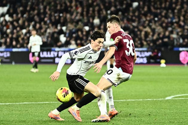 West Ham United v Fulham, Premier League Fulham forward Harry Wilson (8) and West Ham United defender Ollie Scarles (30) during the Premier League match between West Ham United and Fulham at the London Stadium, London, UK on 27 December 2025. London London Stadium UK Editorial use only DataCo restrictions apply See www.football-dataco.com , Copyright: xPaulxBockingx PSI-23477-0145