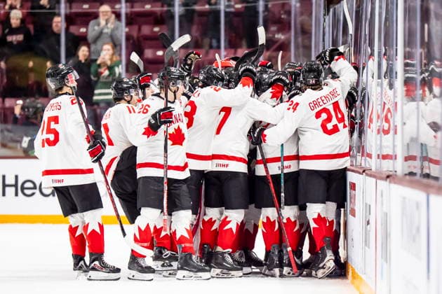 December 27, 2025, Minneapolis, Mn, Canada: Team Canada celebrates after defeating Latvia in overtime IIHF World Junior Championship hockey action, in Minneapolis, Saturday, Dec. 27, 2025. Canada News - December 27, 2025  - ZUMAc35_ 20251227_zaf_c35_095 Copyright: xChristopherxKatsarovx