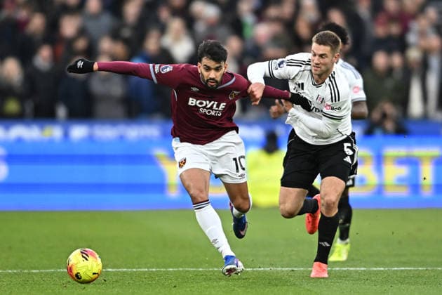 West Ham United v Fulham, Premier League West Ham United midfielder Lucas Paqueta (10) and Fulham defender Joachim Andersen (5)during the Premier League match between West Ham United and Fulham at the London Stadium, London, UK on 27 December 2025. London London Stadium UK Editorial use only DataCo restrictions apply See www.football-dataco.com , Copyright: xPaulxBockingx PSI-23477-0221