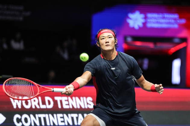 SHENZHEN, CHINA - DECEMBER 28: Zhang Zhizhen of China returns a shot in the Men s Singles match against Valentin Vacherot of Monaco on day 3 of the 2025 World Tennis Continental Cup at Shenzhen Universiade Center on December 28, 2025 in Shenzhen, Guangdong Province of China.  Copyright: xVCGx 111612320695