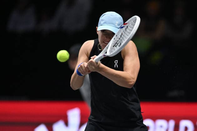 SHENZHEN, CHINA - DECEMBER 27: Iga Swiatek of Poland returns a shot in the Women s Singles match against Wang Xinyu of China on day 2 of the 2025 World Tennis Continental Cup at Shenzhen Universiade Center on December 27, 2025 in Shenzhen, Guangdong Province of China.  Copyright: xVCGx 111612196362