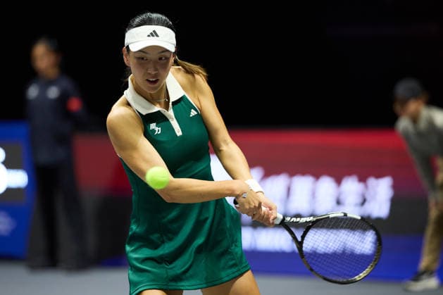 SHENZHEN, CHINA - DECEMBER 27: Wang Xinyu of China returns a shot in the Women s Singles match against Iga Swiatek of Poland on day 2 of the 2025 World Tennis Continental Cup at Shenzhen Universiade Center on December 27, 2025 in Shenzhen, Guangdong Province of China.  Copyright: xVCGx 111612189049