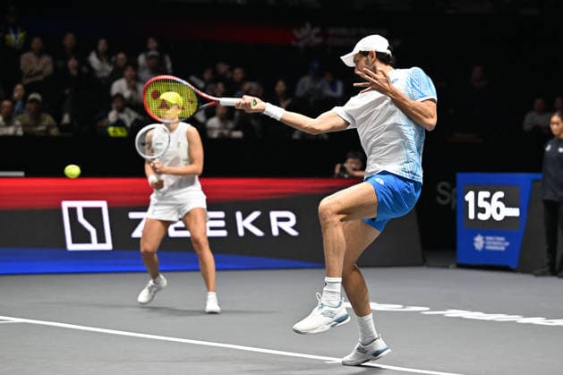 SHENZHEN, CHINA - DECEMBER 28: Iga Swiatek of Poland and Valentin Vacherot of Monaco return a shot in the Mixed Doubles match against Elena Rybakina of Kazakhstan and Andrey Rublev on day 3 of the 2025 World Tennis Continental Cup at Shenzhen Universiade Center on December 28, 2025 in Shenzhen, Guangdong Province of China.  Copyright: xVCGx 111612347926