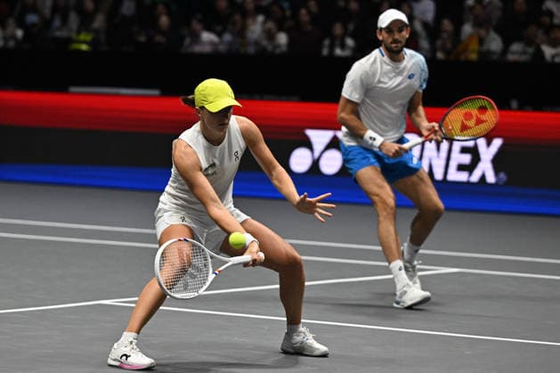 SHENZHEN, CHINA - DECEMBER 28: Iga Swiatek of Poland and Valentin Vacherot of Monaco return a shot in the Mixed Doubles match against Elena Rybakina of Kazakhstan and Andrey Rublev on day 3 of the 2025 World Tennis Continental Cup at Shenzhen Universiade Center on December 28, 2025 in Shenzhen, Guangdong Province of China.  Copyright: xVCGx 111612347932