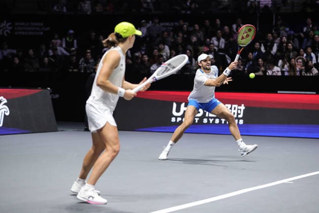 SHENZHEN, CHINA - DECEMBER 28: Iga Swiatek of Poland and Valentin Vacherot of Monaco return a shot in the Mixed Doubles match against Elena Rybakina of Kazakhstan and Andrey Rublev on day 3 of the 2025 World Tennis Continental Cup at Shenzhen Universiade Center on December 28, 2025 in Shenzhen, Guangdong Province of China.  Copyright: xVCGx 111612349542