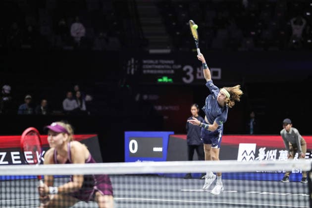 SHENZHEN, CHINA - DECEMBER 28: Elena Rybakina of Kazakhstan and Andrey Rublev return a shot in the Mixed Doubles match against Iga Swiatek of Poland and Valentin Vacherot of Monaco on day 3 of the 2025 World Tennis Continental Cup at Shenzhen Universiade Center on December 28, 2025 in Shenzhen, Guangdong Province of China.  Copyright: xVCGx 111612349543