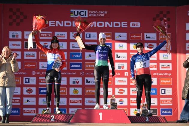 L-R, second Dutch Puck Pieterse, winner Dutch Lucinda Brand and third French Amandine Fouquenet celebrate on the podium at the women s elite race at the World Cup cyclocross cycling event in Dendermonde, Belgium, stage 8 (out of 12) of the UCI World Cup cyclocross competition, Sunday 28 December 2025. DAVIDxPINTENS  x151932279x