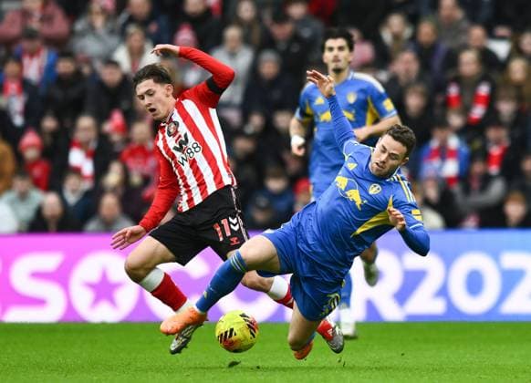 Chris Rigg of Sunderland (left) and Gabriel Gudmundsson of Leeds United Sunderland v Leeds United, Premier League, Football, Stadium of Light, Sunderland, UK - 28 Dec 2025Sunderland Stadium of Light United Kingdom EDITORIAL USE ONLY No use with unauthorised audio, video, data, fixture lists, club league logos or live services. Online in-match use limited to 120 images, no video emulation. No use in betting, games or single club league player publications. Copyright: xRichardxLee Shutterstockx 16213166z