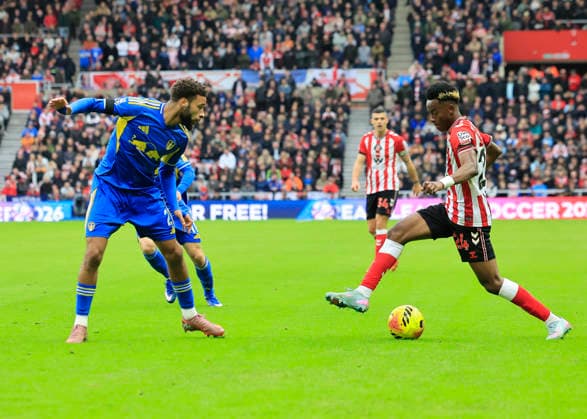 Sunderland v Leeds United Premier League Jayden Bogle of Leeds United (left) defends against Simon Adingra of Sunderland during the Premier League match at the Stadium of Light, Sunderland 28 12 2025 UK Newspapers OUT Copyright: xFredxPalmerx FIL-22706-0088