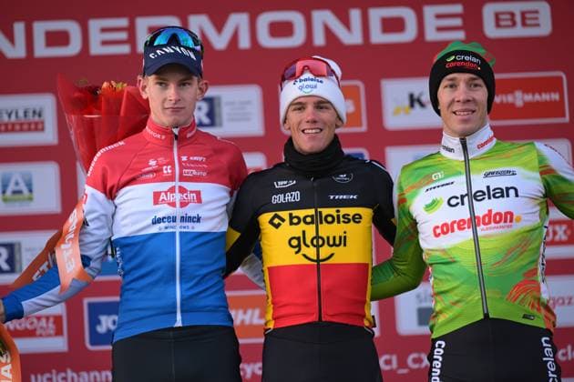 L-R, second Dutch Tibor Del Grosso, winner Belgian Thibau Nys and third Belgian Laurens Sweeck celebrate on the podium of the men s elite race at the World Cup cyclocross cycling event in Dendermonde, Belgium, stage 8 (out of 12) of the UCI World Cup cyclocross competition, Sunday 28 December 2025. DAVIDxPINTENS  x151947925x