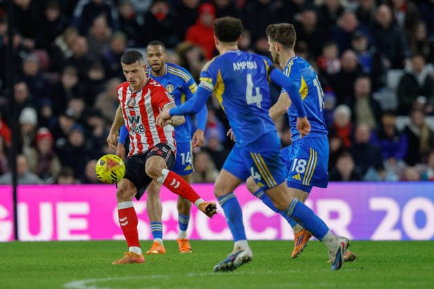 Sunderland v Leeds United, Premier League Granit Xhaka of Sunderland under pressure from Anton Stach and Ethan Ampadu of Leeds United during the Premier League match between Sunderland and Leeds United at the Stadium Of Light, Sunderland, UK on 28 December 2025. Sunderland Stadium Of Light Tyne and Wear UK Editorial use only DataCo restrictions apply See www.football-dataco.com , Copyright: xCraigxCowanx PSI-23476-0142