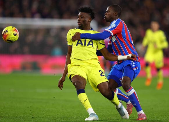 London, England, 28th December 2025. Mohammed Kudus of Tottenham Hotspur and Tyrick Mitchell of Crystal Palace challenge for the ball during the Crystal Palace vs Tottenham Hotspur Premier League match at Selhurst Park, London. Picture credit should read: Paul Terry Sportimage EDITORIAL USE ONLY. No use with unauthorised audio, video, data, fixture lists, club league logos or live services. Online in-match use limited to 120 images, no video emulation. No use in betting, games or single club league player publications. SPI_027_PT_Crystal_Palace_Tottenham SPI-4399-0027