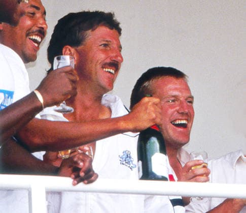 Cricket - 1991 England v West Indies 5th test. 12 08 1991 Oval Cricket ground 1991 England Celebrations Phil DeFreitas, Ian Botham and Hugh Morris celebrate (with champagne) which saw England draw the series 2-2, beating the West Indies by 5 wickets. Micky also played football for Charlton Athletic 
