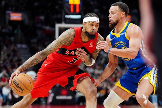 December 28, 2025, Toronto, On, CANADA: Toronto Raptors forward Brandon Ingram (3) tries to drive past Golden State Warriors guard Stephen Curry (30) during second half NBA, Basketball Herren, USA basketball action in Toronto, Sunday, Dec. 28, 2025. Canada News - December 28, 2025 - ZUMAc35_ 20251228_zaf_c35_016 Copyright: xFrankxGunnx