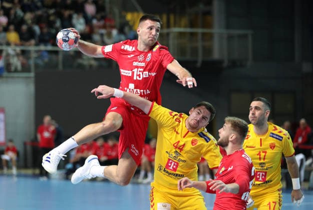 Croatia v North Macedonia: Friendly match Leon Ljevar of Croatia and Mihail Alarov of North Macedonia during the friendly handball match between Croatia and North Macedonia at Zatika Hall od December 28, 2025. in Porec, Croatia.  SasaxMiljevic PIXSELL