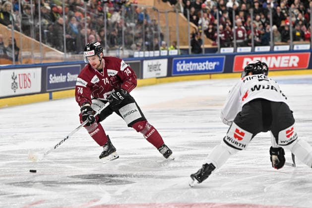 DAVOS, SWITZERLAND - DECEMBER 29: Adam Raska of Sparta Praha L) in action during the Spengler Cup Davos match between HC Sparta Praha v Team Canada at Zondacrypto-Arena on December 29, 2025 in Davos, Switzerland. Davos Graubunden Switzerland Copyright: xJustPictures.ch AndreaxBrancax jp-en-EuSpIm-AB_29122025_AAB_3613