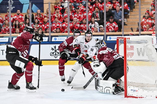 DAVOS, SWITZERLAND - DECEMBER 29: Anthony Richard of Team Canada tries to score against goalkeeper Jakub Kovar of Sparta Praha R) during the Spengler Cup Davos match between HC Sparta Praha v Team Canada at Zondacrypto-Arena on December 29, 2025 in Davos, Switzerland. Davos Graubunden Switzerland Copyright: xJustPictures.ch AndreaxBrancax jp-en-EuSpIm-AB_29122025_AAB_4760