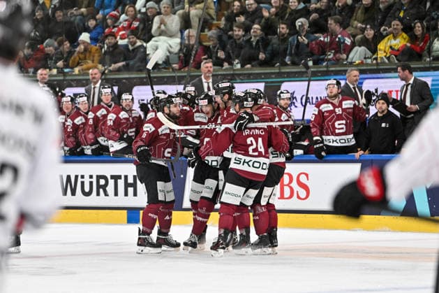 DAVOS, SWITZERLAND - DECEMBER 29: Martins Dzierkals of Sparta Praha L) celebrate his goal with Dominik Masin of Sparta Praha, Krystof Hrabik of Sparta Praha and Aaron Irving of Sparta Praha during the Spengler Cup Davos match between HC Sparta Praha v Team Canada at Zondacrypto-Arena on December 29, 2025 in Davos, Switzerland. Davos Graubunden Switzerland Copyright: xJustPictures.ch AndreaxBrancax jp-en-EuSpIm-AB_29122025_AAB_4973