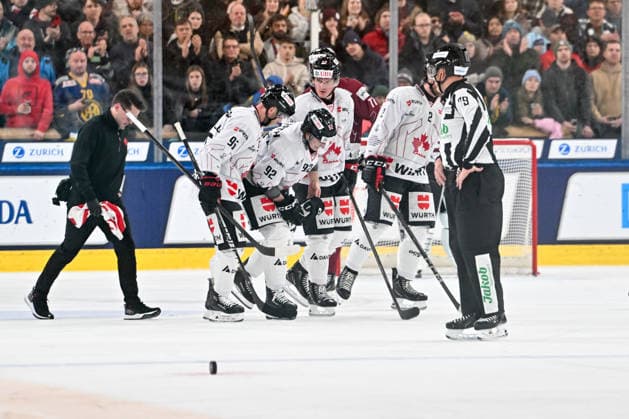 DAVOS, SWITZERLAND - DECEMBER 29: Mike Sgarbossa of Team Canada leaves the ice injuried during the Spengler Cup Davos match between HC Sparta Praha v Team Canada at Zondacrypto-Arena on December 29, 2025 in Davos, Switzerland. Davos Graubunden Switzerland Copyright: xJustPictures.ch AndreaxBrancax jp-en-EuSpIm-AB_29122025_AAB_5143