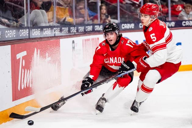 December 29, 2025, Minneapolis, Mn, Canada: Canada s Jett Luchanko (17) and Denmark s Markus Jakobsen (5) vie for control of the puck during during first period IIHF World Junior Championship hockey action in Minneapolis on Monday, Dec. 29, 2025. Canada News - December 29, 2025  - ZUMAc35_ 20251229_zaf_c35_054 Copyright: xChristopherxKatsarovx