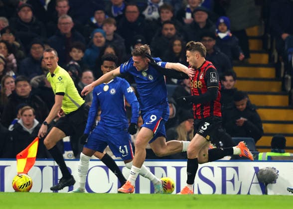 30th December 2025; Stamford Bridge, Chelsea, London, England: Premier League Football, Chelsea versus Bournemouth; Liam Delap of Chelsea challenged by Adrien Truffert of AFC Bournemouth  JohnxPatrickxFletcher