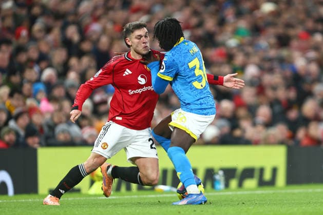 Manuel Ugarte of Manchester United, ManU collides with Mateus Mane of Wolves Manchester United v Wolverhampton Wanderers, Premier League, Football, Old Trafford, Manchester, UK - 30 Dec 2025Manchester Old Trafford United Kingdom EDITORIAL USE ONLY No use with unauthorised audio, video, data, fixture lists, club league logos or live services. Online in-match use limited to 120 images, no video emulation. No use in betting, games or single club league player publications. Copyright: xPhilxOldham Shutterstockx 16216223u