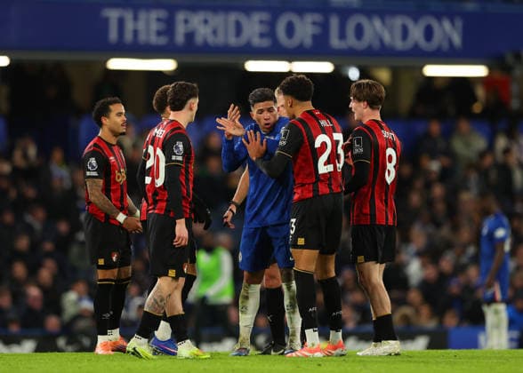 30th December 2025; Stamford Bridge, Chelsea, London, England: Premier League Football, Chelsea versus Bournemouth; Enzo Fernandez of Chelsea clashing with James Hill of AFC Bournemouth  JohnxPatrickxFletcher