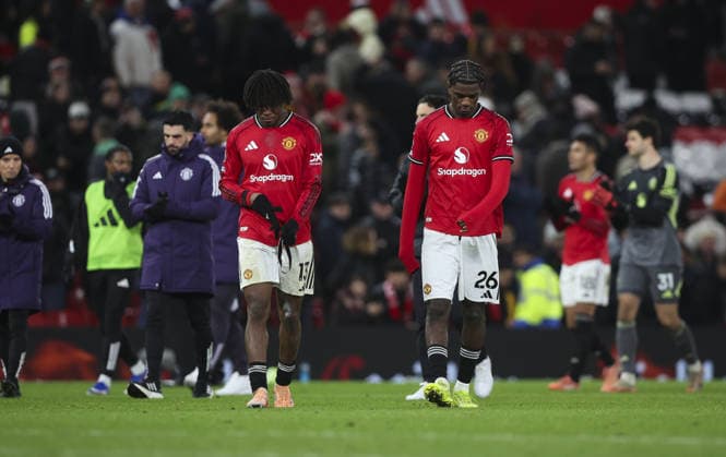 Manchester United, ManU v Wolverhampton Wanderers, FA Premier League 30.12.25 Manchester United v Wolverhampton Wanderers, FA Premier League Bradley Ormesher The Times Ayden Heaven and Patrick Dorgu of Manchester United at full time  Copyright: xBradleyxOrmesherx NINTCHDBPICT001048615220
