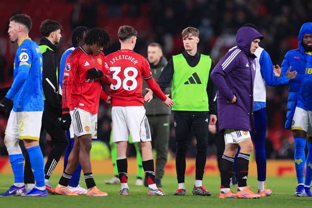 Football - Premier League - Manchester United, ManU v Wolverhampton Wanderers 30th December 2025 - Premier League - Manchester United v Wolverhampton Wanderers - Jack Fletcher of Manchester United (L) shakes hands with his brother, Tyler Fletcher of Manchester United after the match - Photo: Simon Stacpoole Offside. Manchester UK Copyright: xSimonxStacpoolexOffside