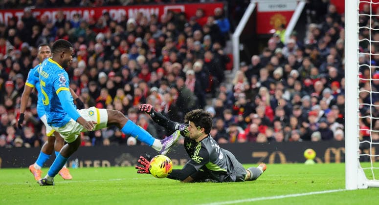 30th December 2025; Old Trafford, Manchester, England; Premier League Football, Manchester United, ManU versus Wolverhampton Wanderers; Yerson Mosquera of Wolverhampton Wanderers shots from close range at Goalkeeper Senne Lammens of Manchester United  RogerxEvans