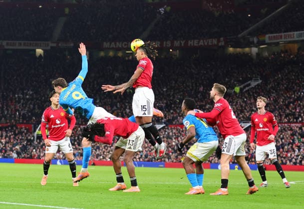 30th December 2025; Old Trafford, Manchester, England; Premier League Football, Manchester United, ManU versus Wolverhampton Wanderers; Leny Yoro of Manchester United wins a header against Jorgen Strand Larsen of Wolverhampton Wanderers  RogerxEvans