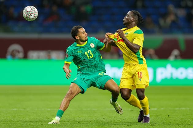 TotalEnergies CAF AFACON Morocco 2025 - Satde Moulay Abellah - Rabat - Morocco SenegaleÂ s Iliman Cheikh Ndiaye 13 and BeninÂ sIshola Jumior 18 in action during the Africa Cup of Nations (CAN) 2025 football match between Senegal and Benin at the Grand Satde of Tanger n Tanger on December 30, 2025. Copyright: xloulidiphotox