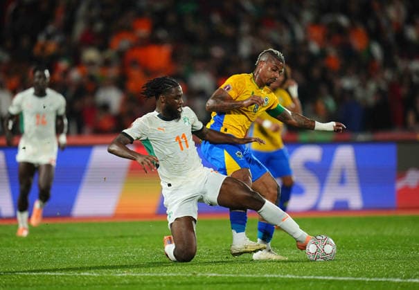 Mario RenÃ Junior Lemina (Gabon) and Jean Philippe Nils Stephan Krasso (CÃ te d Ivoire) battle for the ball during the Africa Cup Of Nations match between Gabon and Ivory Coast at Marrakesh Stadium on December 31, 2025 in Marrakech, Morocco. (Photo by Thor Wegner DeFodi Images) -