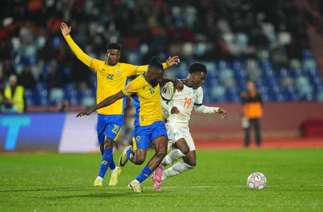Andre Biyogo Poko (Gabon) and Christ Ravynel Inao Oulai (CÃ te d Ivoire) battle for the ball during the Africa Cup Of Nations match between Gabon and Ivory Coast at Marrakesh Stadium on December 31, 2025 in Marrakech, Morocco. (Photo by Thor Wegner DeFodi Images) -