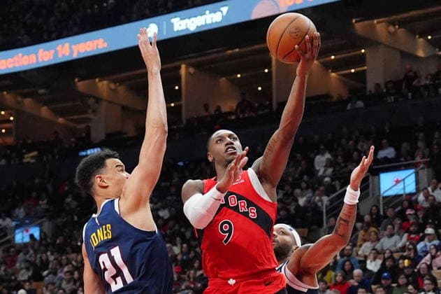December 31, 2025, Toronto, On, CANADA: Toronto Raptors forward guard RJ Barrett (9) jumps with the ball towards the basket as Denver Nuggets forward Spencer Jones (21) defends during second half NBA, Basketball Herren, USA action in Toronto on Wednesday December 31, 2025. Canada News - December 31, 2025  - ZUMAc35_ 20251231_zaf_c35_065 Copyright: xFrankxGunnx