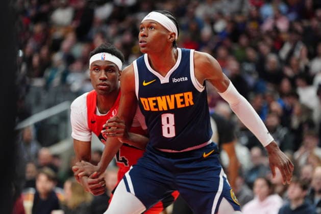 December 31, 2025, Toronto, On, CANADA: Denver Nuggets guard Peyton Watson (8) and Toronto Raptors guard Ja Kobe Walter (14) fight for position during second half NBA, Basketball Herren, USA action in Toronto on Wednesday December 31, 2025. Canada News - December 31, 2025  - ZUMAc35_ 20251231_zaf_c35_067 Copyright: xFrankxGunnx