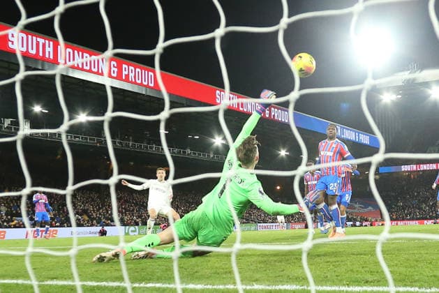 1st January 2026; Selhurst Park, Selhurst, London, England; Premier League Football, Crystal Palace versus Fulham; goalkeeper Dean Henderson of Crystal Palace saves from Timothy Castagne of Fulham  KatiexChan
