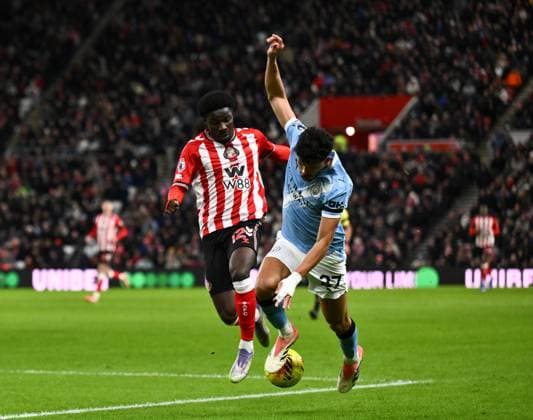 Matheus Nunes of Manchester City (right) and Eliezer Mayenda of Sunderland Sunderland v Manchester City, Premier League, Football, Stadium of Light, Sunderland, UK - 01 Jan 2026Sunderland Stadium of Light United Kingdom EDITORIAL USE ONLY No use with unauthorised audio, video, data, fixture lists, club league logos or live services. Online in-match use limited to 120 images, no video emulation. No use in betting, games or single club league player publications.  Copyright: xRichardxLee Shutterstockx 16216366u