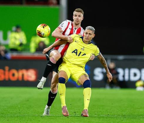 Richarlison of Tottenham Hotspur competes for the ball with Kristoffer Ajer of Brentford Brentford v Tottenham Hotspur, Football, Premier League, Gtech Community Stadium, London, UK - 01 01 2026 EDITORIAL USE ONLY No use with unauthorised audio, video, data, fixture lists (outside the EU), club league logos or live services. Online in-match use limited to 45 images (+15 in extra time). No use to emulate moving images. No use in betting, games or Copyright: xMattxImpey Shutterstockx 16220625m