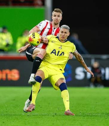 Richarlison of Tottenham Hotspur competes for the ball with Kristoffer Ajer of Brentford Brentford v Tottenham Hotspur, Football, Premier League, Gtech Community Stadium, London, UK - 01 01 2026 EDITORIAL USE ONLY No use with unauthorised audio, video, data, fixture lists (outside the EU), club league logos or live services. Online in-match use limited to 45 images (+15 in extra time). No use to emulate moving images. No use in betting, games or Copyright: xMattxImpey Shutterstockx 16220625n