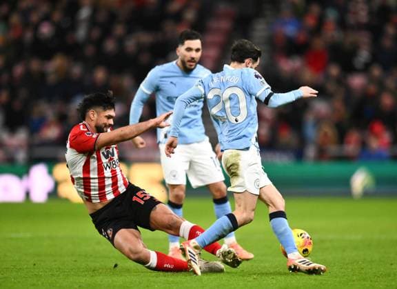 Omar Alderete of Sunderland slides in with a challenge on m209 Sunderland v Manchester City, Premier League, Football, Stadium of Light, Sunderland, UK - 01 Jan 2026Sunderland Stadium of Light United Kingdom EDITORIAL USE ONLY No use with unauthorised audio, video, data, fixture lists, club league logos or live services. Online in-match use limited to 120 images, no video emulation. No use in betting, games or single club league player publications.  Copyright: xRichardxLee Shutterstockx 16216366aa