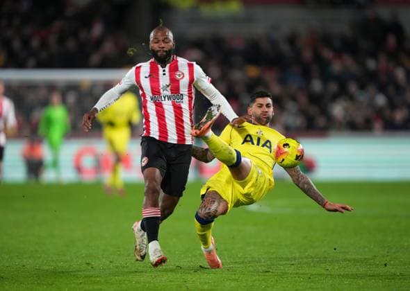 Cristian Romero of Tottenham Hotspur tries to clear the ball, misses and manages. To foul Igor Thiago of Brentford Brentford v Tottenham Hotspur, Premier League, Football, Gtech Community Stadium, London, UK - 01 Jan 2026London Gtech Community Stadium United Kingdom EDITORIAL USE ONLY No use with unauthorised audio, video, data, fixture lists, club league logos or live services. Online in-match use limited to 120 images, no video emulation. No use in betting, games or single club league player publications. Copyright: xJedxLeicester Shutterstockx 16216360m