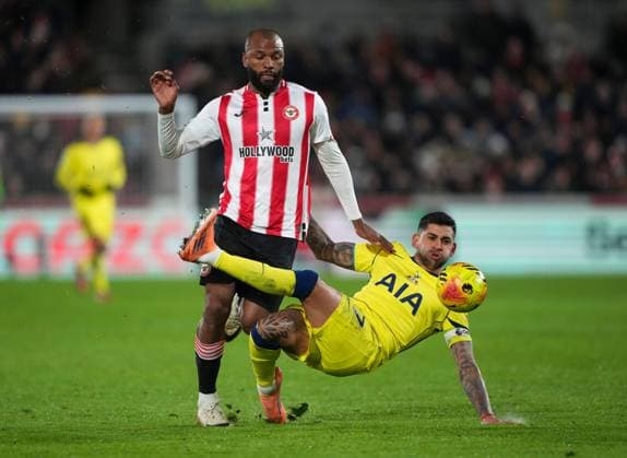Cristian Romero of Tottenham Hotspur tries to clear the ball, misses and manages. To foul Igor Thiago of Brentford Brentford v Tottenham Hotspur, Premier League, Football, Gtech Community Stadium, London, UK - 01 Jan 2026London Gtech Community Stadium United Kingdom EDITORIAL USE ONLY No use with unauthorised audio, video, data, fixture lists, club league logos or live services. Online in-match use limited to 120 images, no video emulation. No use in betting, games or single club league player publications. Copyright: xJedxLeicester Shutterstockx 16216360k