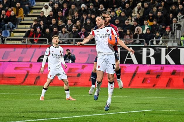 Adrien Rabiot of AC Milan, Semih Kilicsoy of Cagliari Calcio during Cagliari Calcio vs AC Milan, Italian soccer Serie A match in Cagliari, Italy, January 02 2026  Copyright: xLuigixCanu IPAxSportx xipa-agency.netx xx IPA_69629600 IPA_Agency_IPA69629600