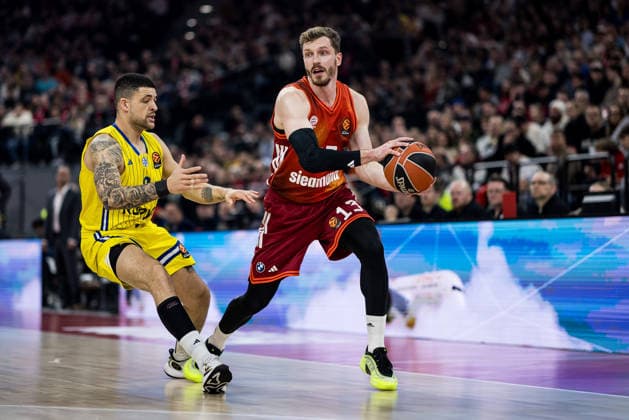 MUNICH, GERMANY - JANUARY 02: Iffe Lundberg (Maccabi Tapyd Tel Aviv, 0), Andreas Andi Obst (FC Bayern Muenchen, 13) with the ball during the Turkish Airlines EuroLeague match between FC Bayern Muenchen vs. Maccabi Tapyd Tel Aviv at SAP Garden on round 18 of Turkish Airlines EuroLeague on January 02, 2026 in Munich, Germany. Bavaria Germany Copyright: xSteffiexWunderlx