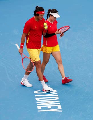 (260103) -- SYNDEY, Jan. 3, 2026 -- Zhu Lin (R) Zhang Zhizhen of China react during the mixed doubles match against Elise Mertens Zizou Bergs of Belgium in the Group B round robin match between China and Belgium at the 2026 United Cup tennis tournament in Sydney, Australia, Jan. 3, 2026. ) (SP)AUSTRALIA-SYNDEY-TENNIS-UNITED CUP-CHN VS BEL MaxPing 