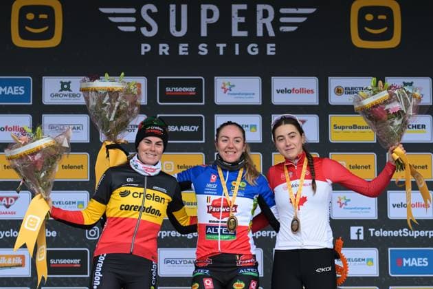 Belgian Marion Norbert Riberolle, French Amandine Fouquenet and Canadian Rafaelle Carrier pictured on the podium after the women elite race at the cyclocross cycling event in Gullegem on Saturday 03 January 2026, stage 7 8 in the Superprestige cyclocross cycling competition DAVIDxPINTENS  x153276809x