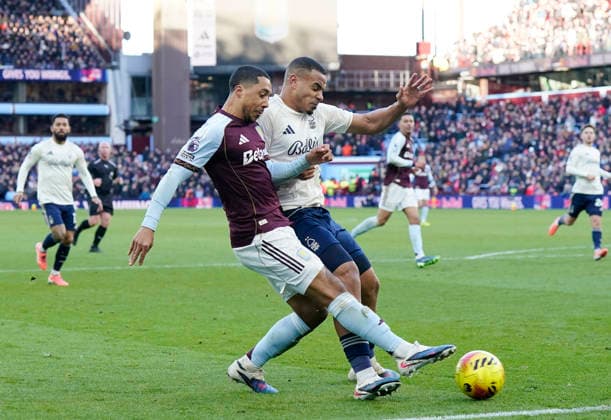 Birmingham, England, 3rd January 2026. Youri Tielemans of Aston Villa tussles with Murillo of Nottingham Forest during the Aston Villa vs Nottingham Forest Premier League match at Villa Park, Birmingham. Picture credit should read: Andrew Yates Sportimage EDITORIAL USE ONLY. No use with unauthorised audio, video, data, fixture lists, club league logos or live services. Online in-match use limited to 120 images, no video emulation. No use in betting, games or single club league player publications. SPI_055_AY_Villa_Forest SPI-4426-0055