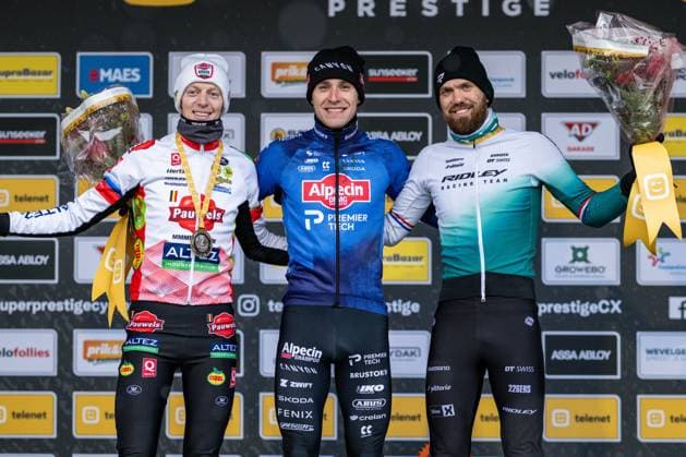 Belgian Michael Vanthourenhout, Belgian Niels Vandeputte and Dutch Joris Nieuwenhuis pictured on the podium after the men elite race at the cyclocross cycling event in Gullegem on Saturday 03 January 2026, stage 7 8 in the Superprestige cyclocross cycling competition DAVIDxPINTENS  x153304115x